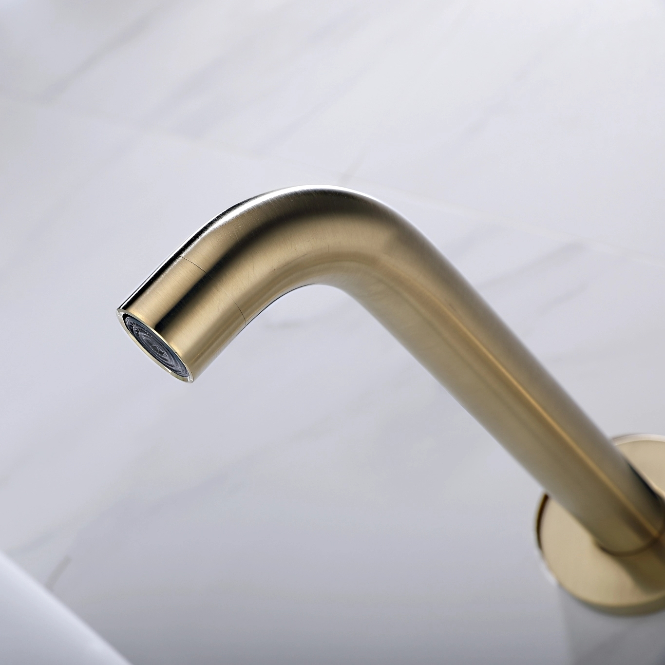 Brushed gold wall mounted basin mixer