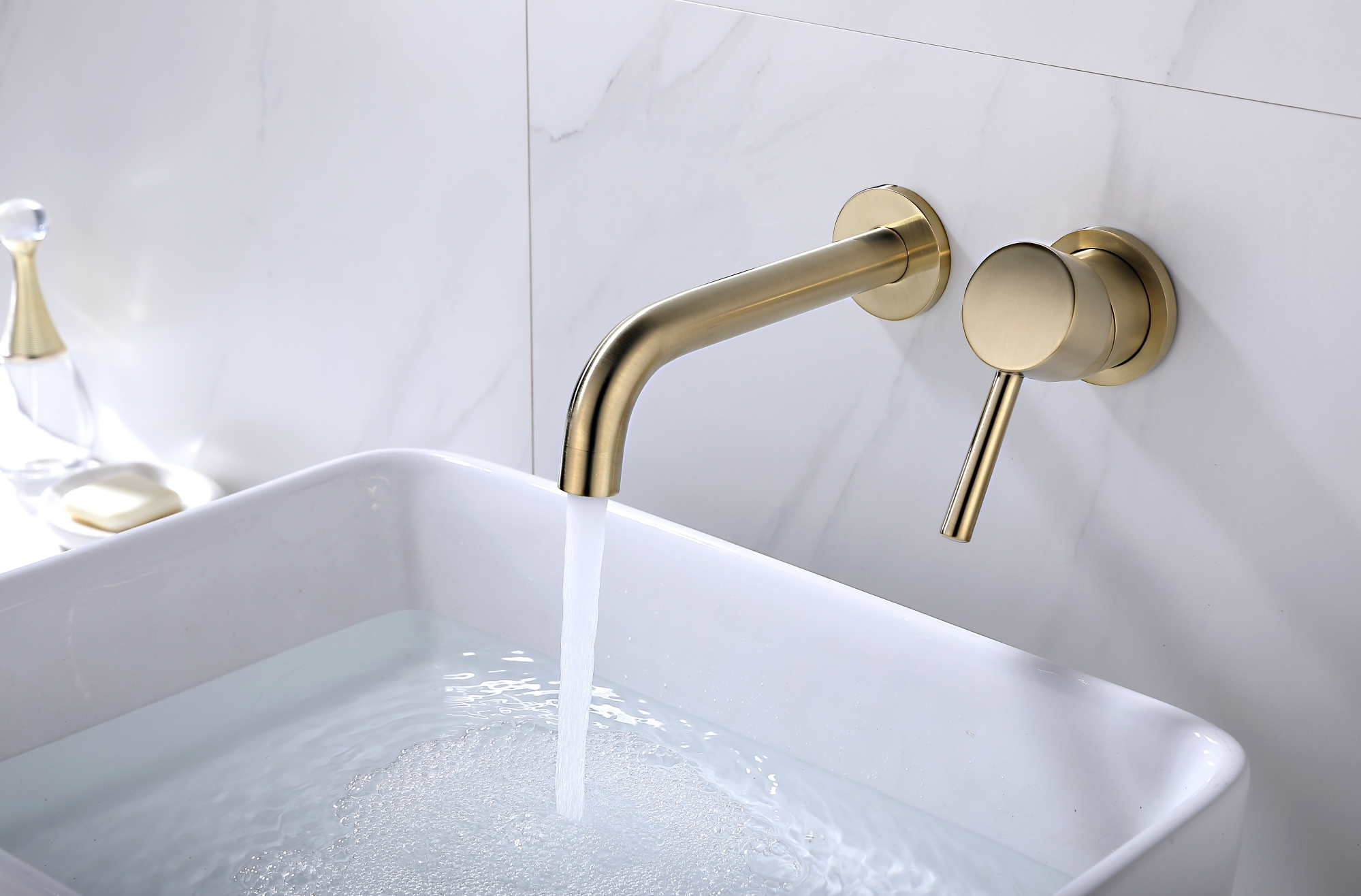Brushed gold wall mounted basin mixer
